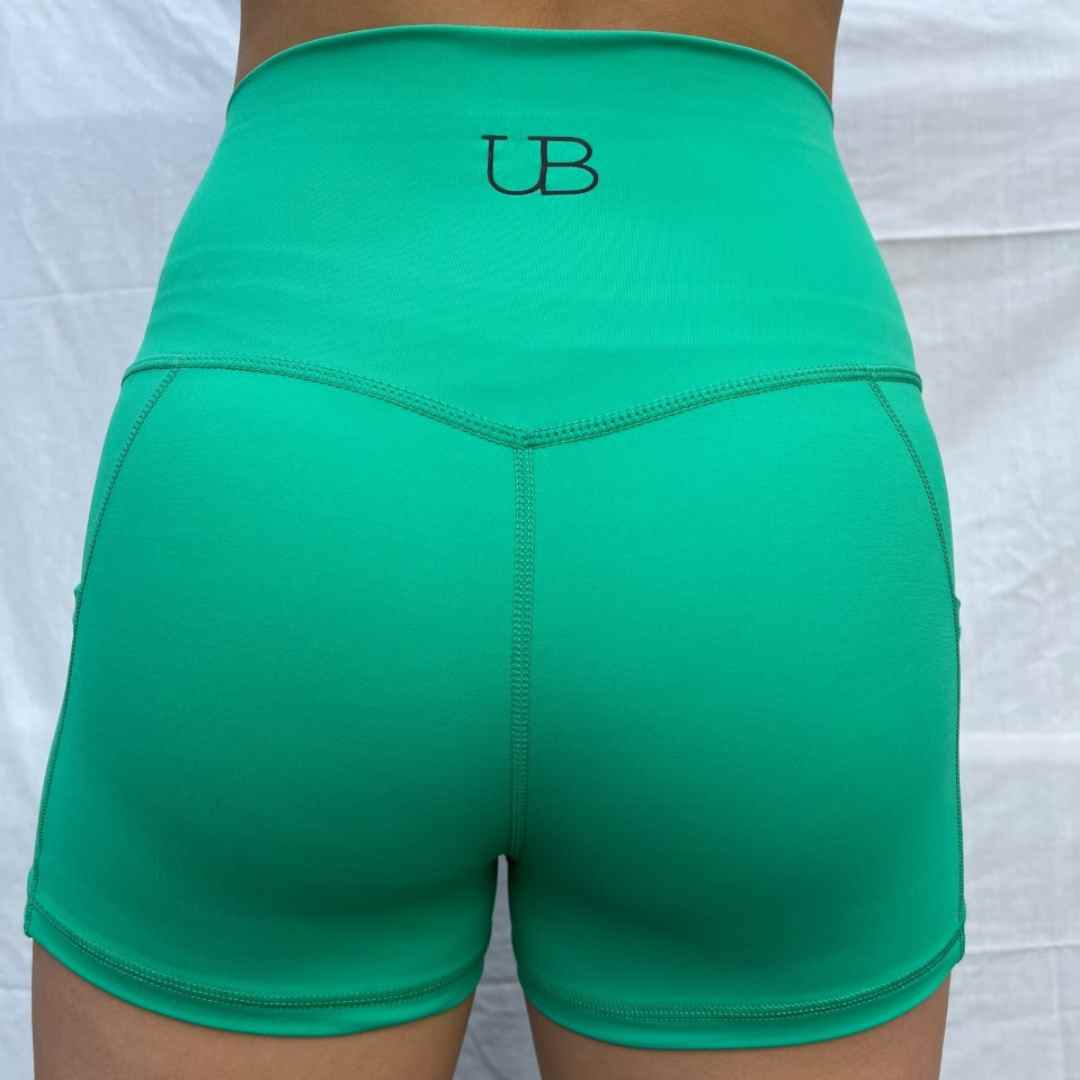 green pocketed yoga booty shorts unseen beauty quality athleisure trendy fashion wear back 2